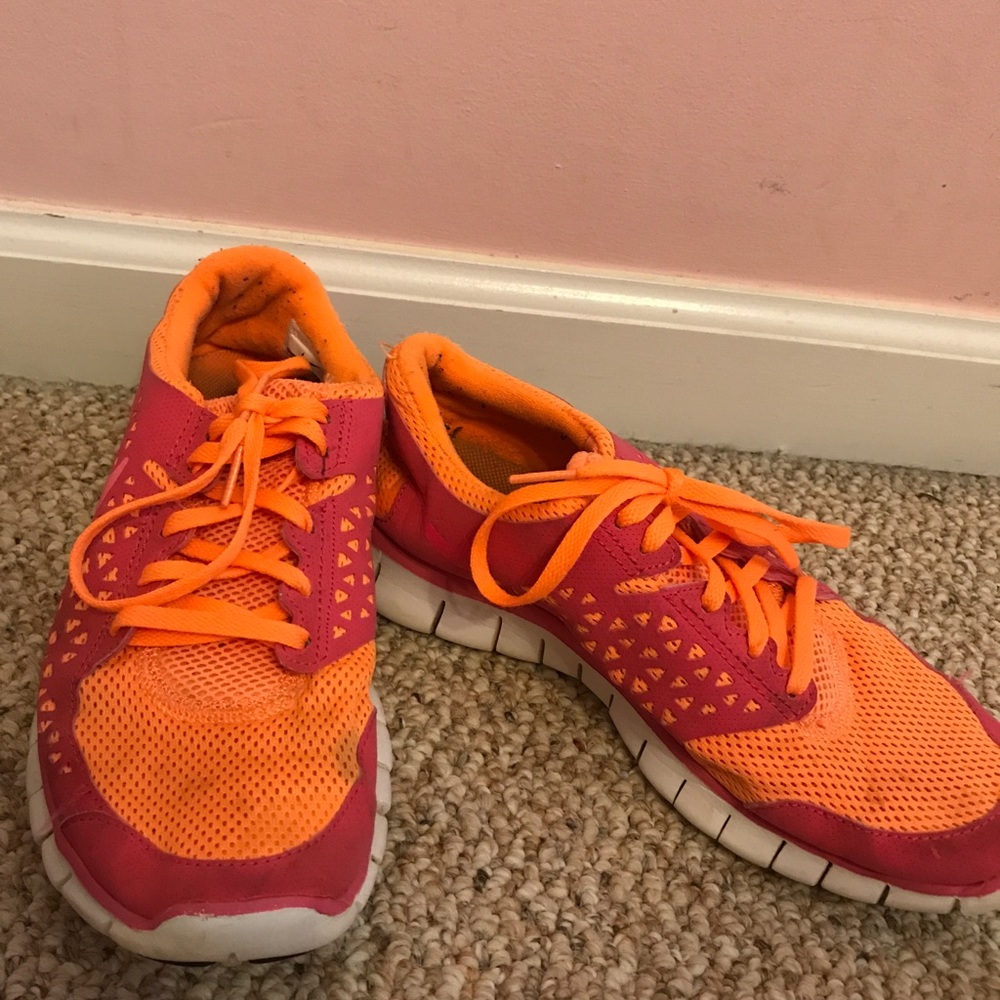 Pink and Orange Nike Free Runs